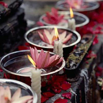 candles burning with flowers